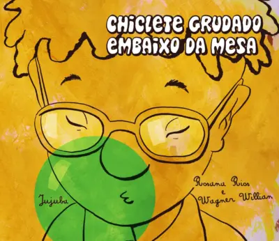 Chiclete grudado embaixo da mesa